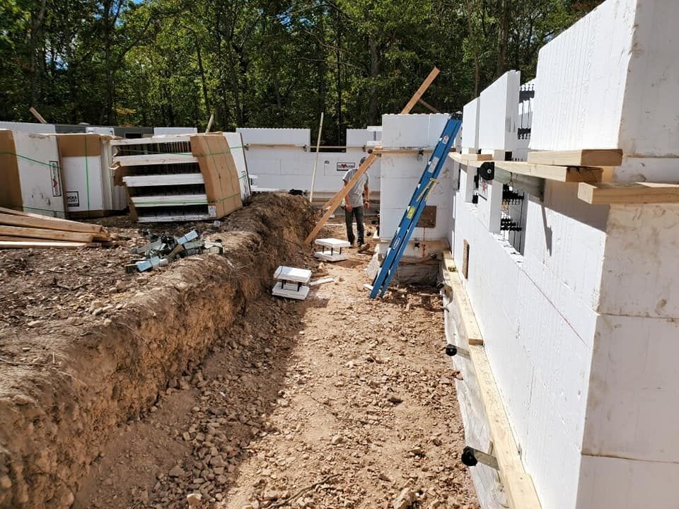 icf crew member installing icf footers and walls - Little Rock AR