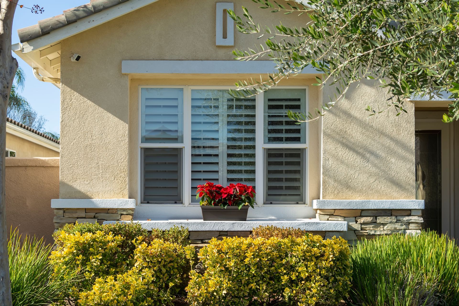Stucco and stone siding on residential home | Springfield, MO