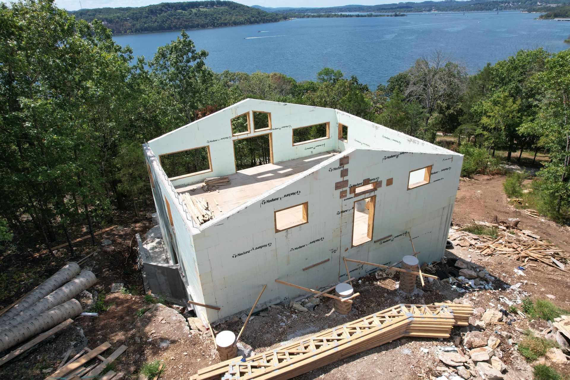 ICF dry-in home construction overlooking Lake of the Ozarks with Nudura walls installed