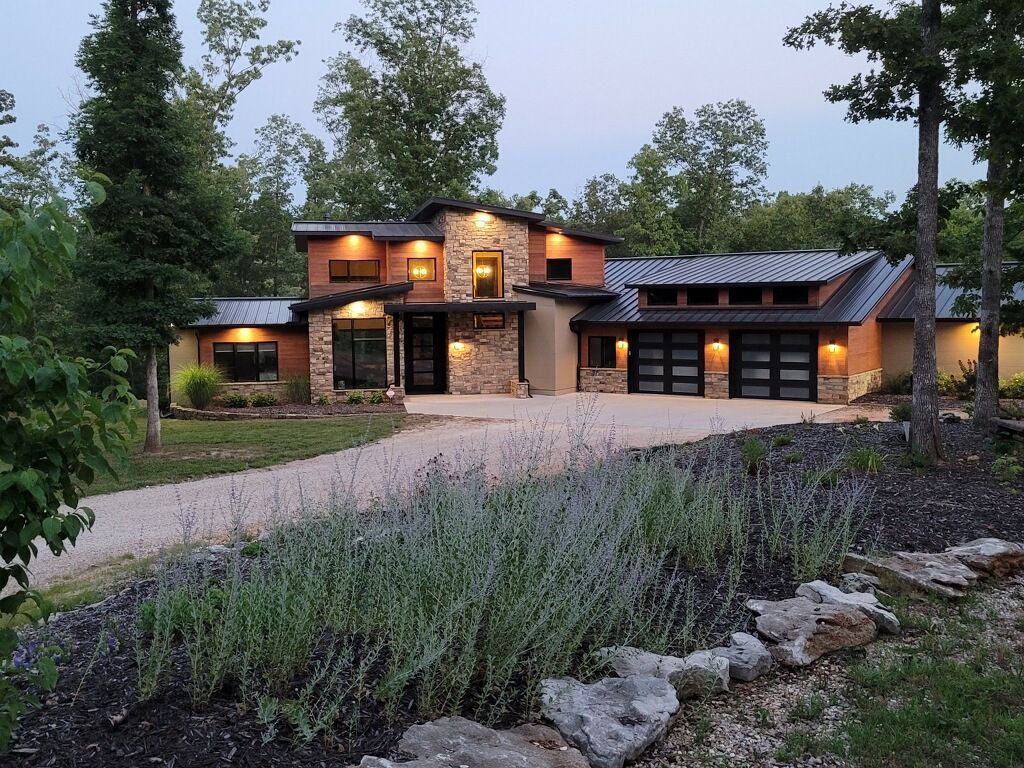Custom home built with insulated concrete forms with mixed wood stone exterior | Sparta, MO