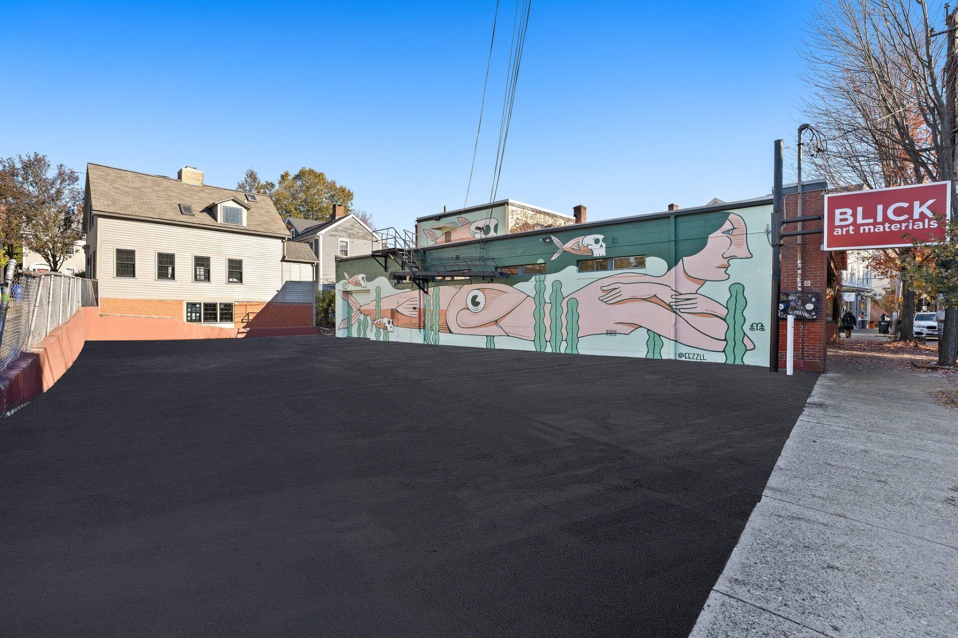 A brick building with a sign that says blick on it