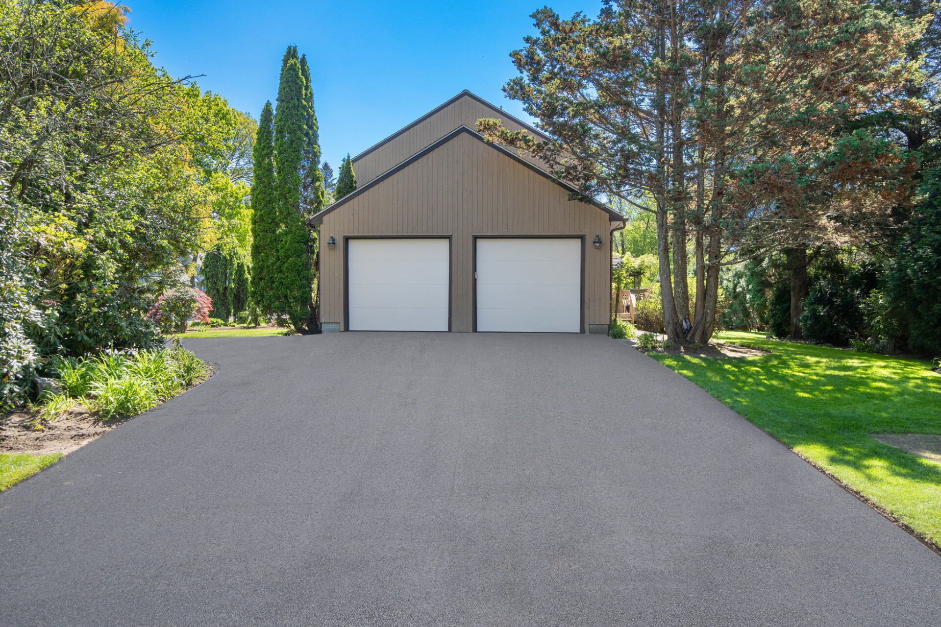 a house with a new paved driveway