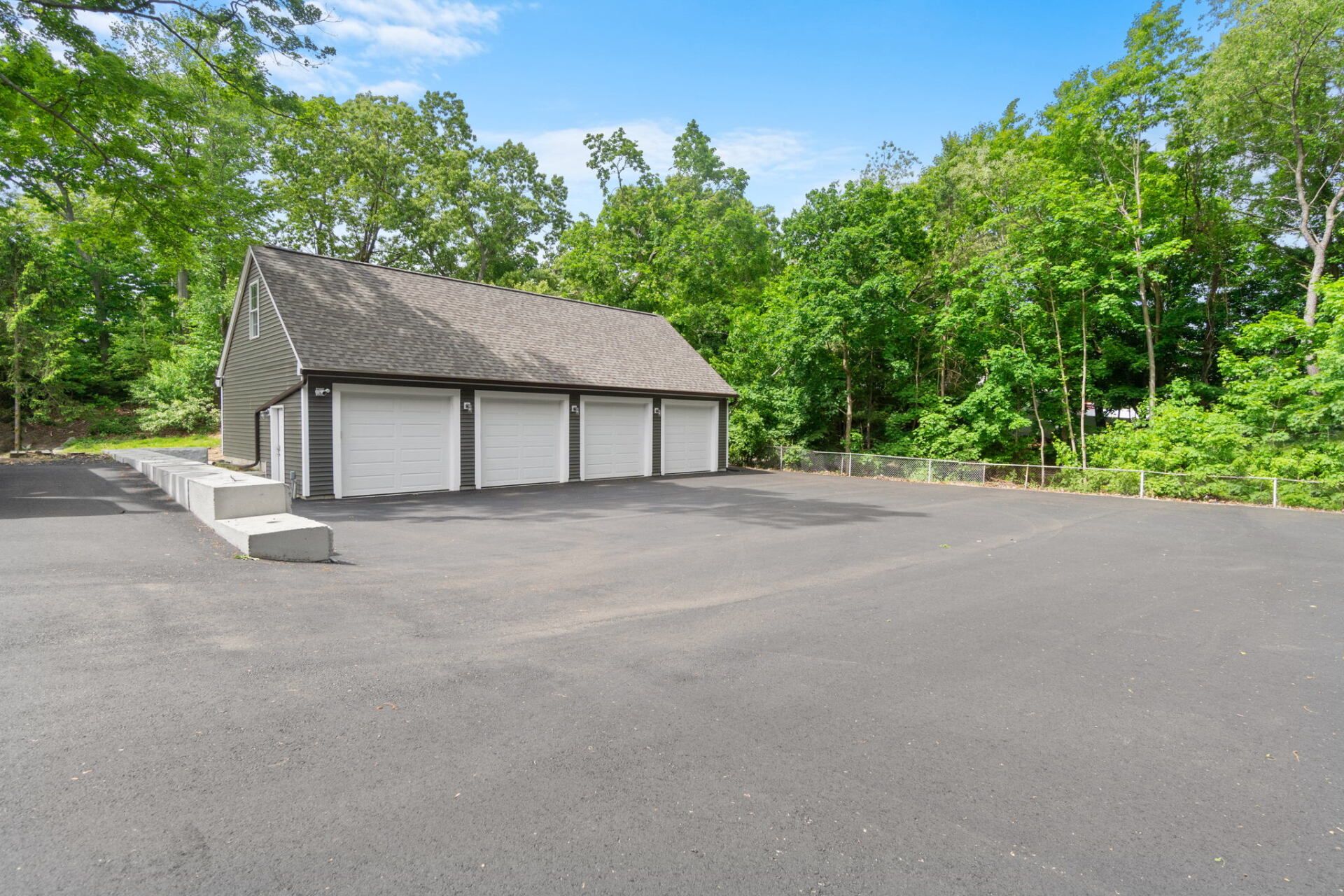 a house with a new paved driveway