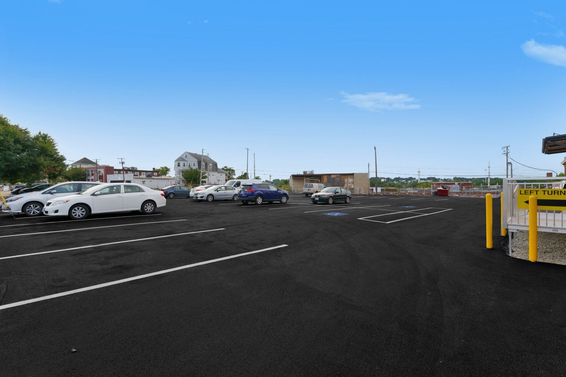 A lot of cars are parked in a parking lot