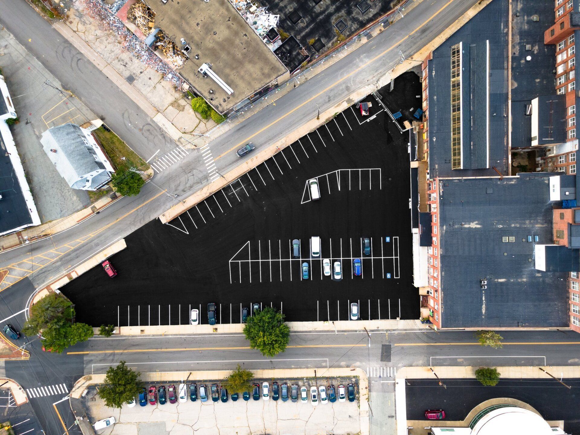 An aerial view of a parking lot in a city