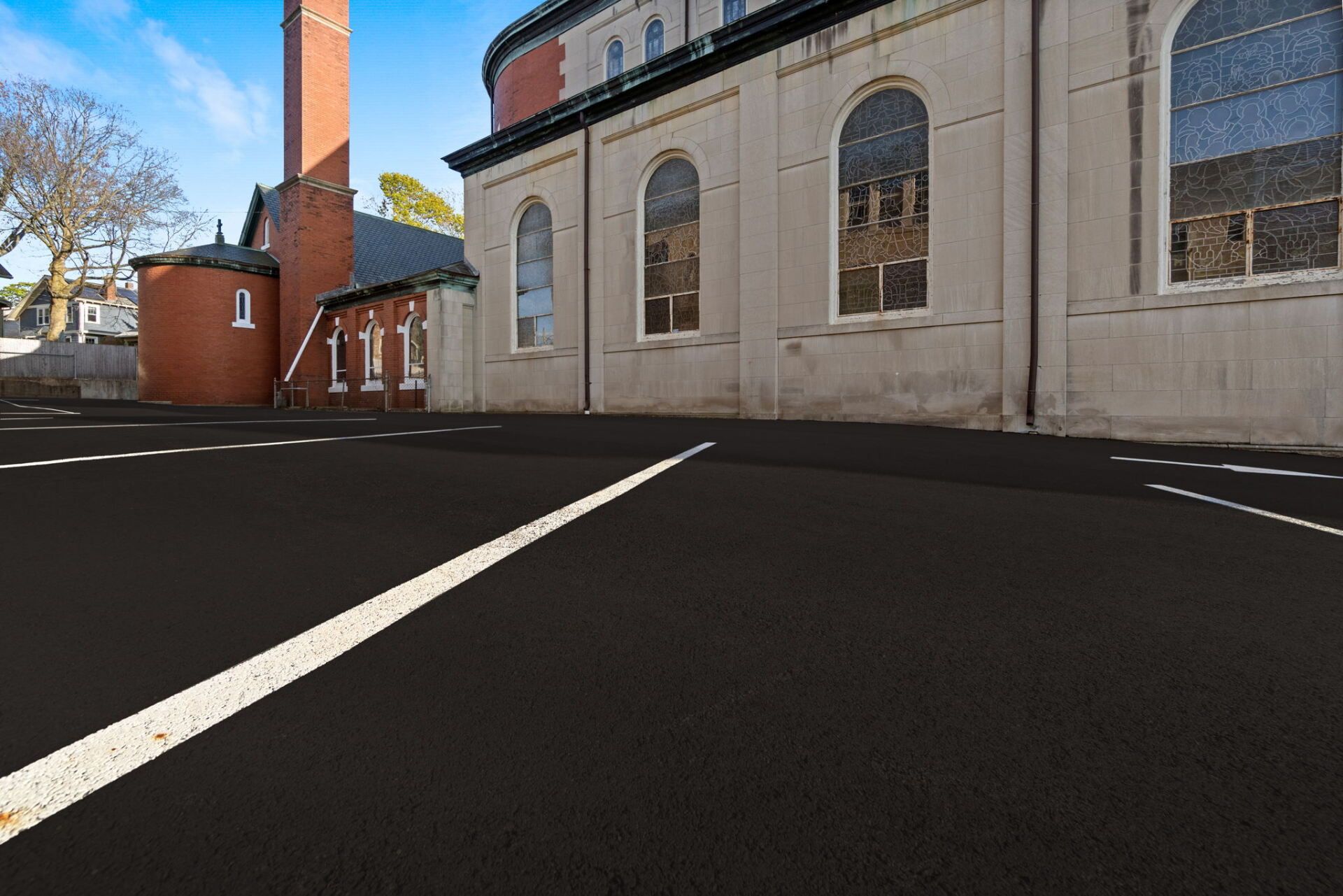 a church with a new paved driveway