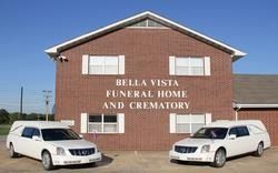 Bella Vista Funeral Home and Crematory building with two white hearses parked out front