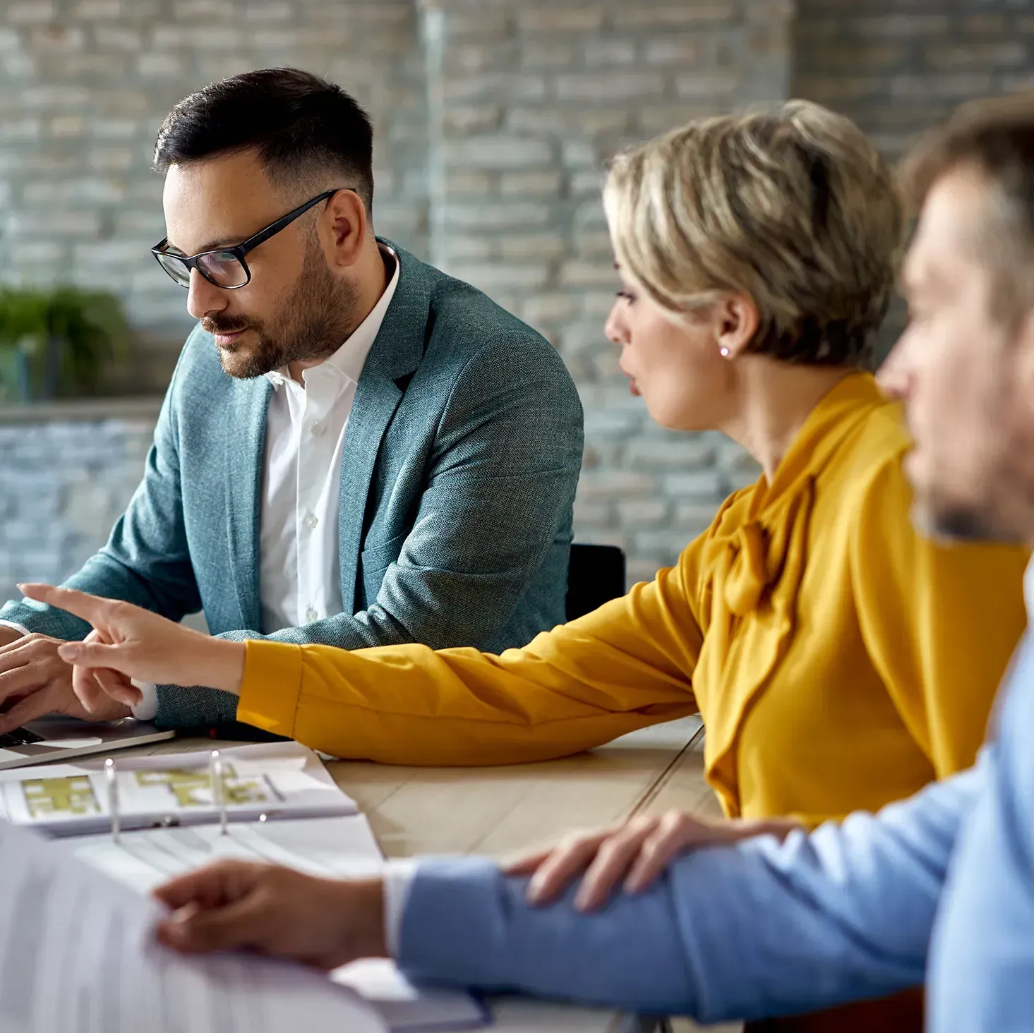 A client and an accountant together having a business meeting