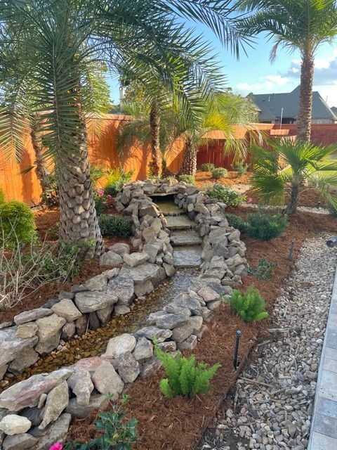 Waterfall water feature installed in Lafayette, LA by Beau Monde 