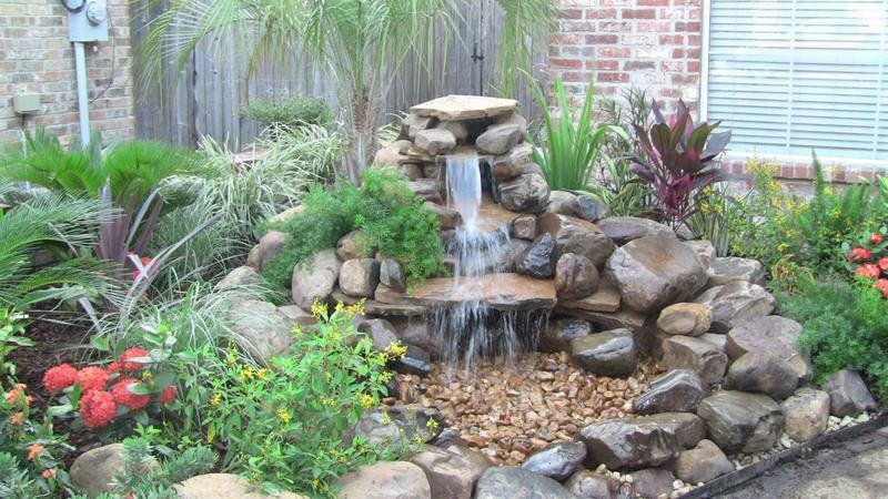 Custom waterfall feature and landscape installed in Lafayette, LA