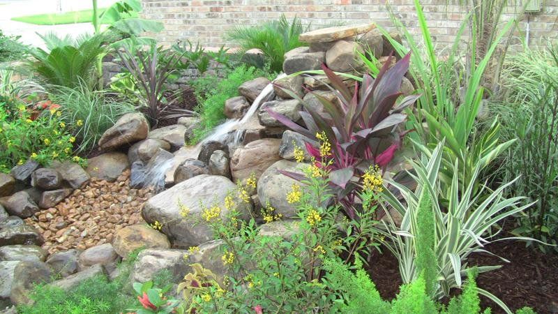 Custom waterfall feature and landscape installed in Lafayette, LA