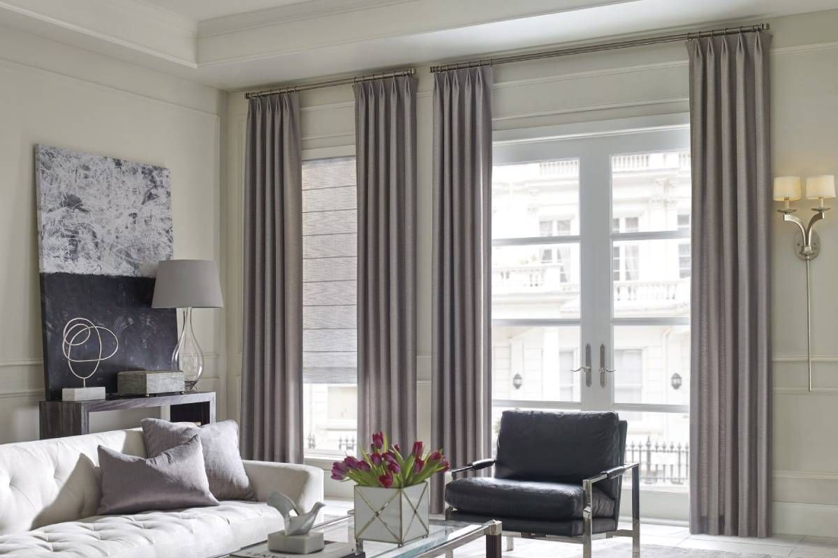 Simple Grey drapes adorning french doors in a modern apartment near Elizabethtown, Kentucky (KY)