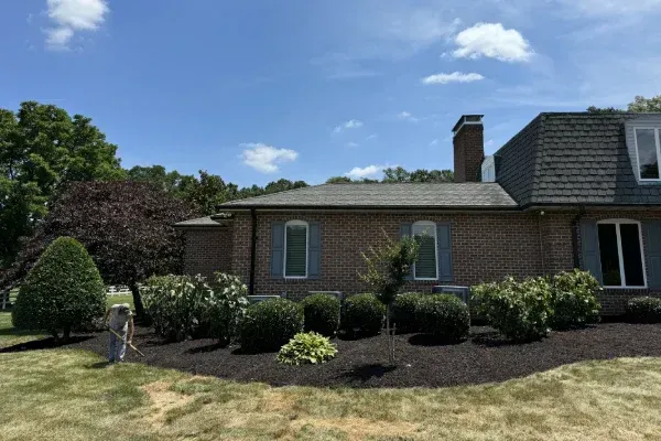 bed mulching in Spring Grove PA helping suppress weeds and protect plants while improving curb appeal