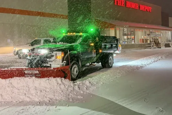 Commercial snow removal services in Spring Grove PA clearing parking lots sidewalks and business properties for safe winter access