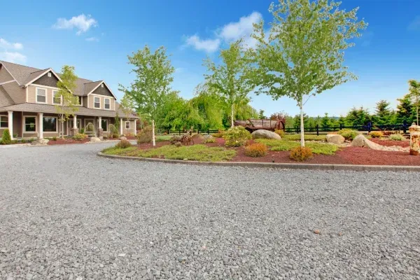 Crushed stone driveway installation in Spring Grove PA providing a stable and long lasting gravel surface for homes