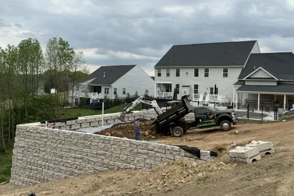 Decorative retaining wall design in Spring Grove PA improving curb appeal while managing elevation changes in landscapes