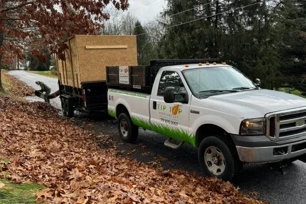 Fall cleanup and leaf removal in Spring Grove PA clearing leaves debris and yard waste to prepare properties for winter
