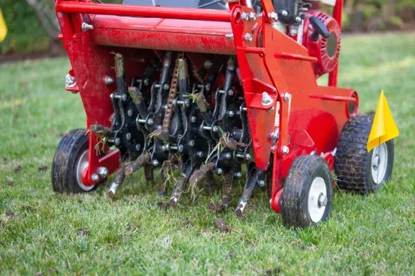 Core aeration services in Spring Grove PA reducing soil compaction and enhancing nutrient absorption for healthier lawns