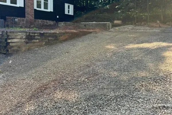 Gravel driveway installation in Spring Grove PA creating durable and affordable residential vehicle access surfaces