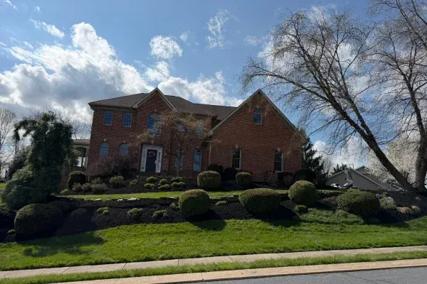 Landscaping services in Hampstead MD providing lawn care planting and outdoor property improvement for residential yards