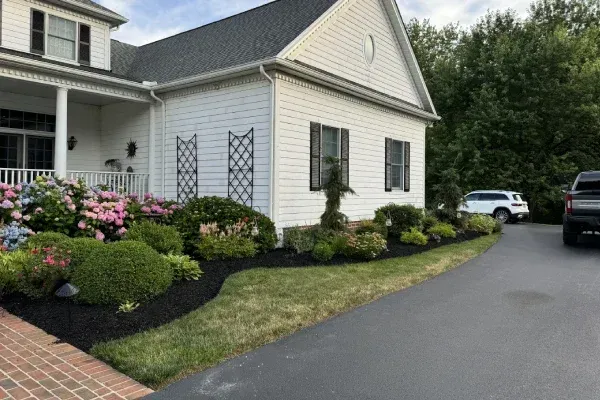 Landscape installation services in Spring Grove PA creating custom outdoor spaces with plants hardscapes and design elements