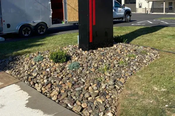 Mulch to river rock conversion in Spring Grove PA upgrading landscape beds for lower maintenance and improved drainage