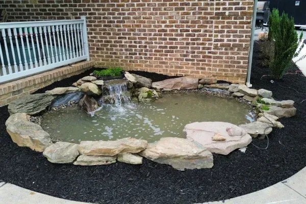 Pond installation services in Spring Grove PA creating beautiful and relaxing water features for residential landscapes