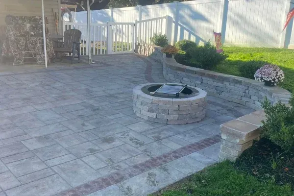 Stone fire pit construction in Spring Grove PA building durable and attractive outdoor features for year round use
