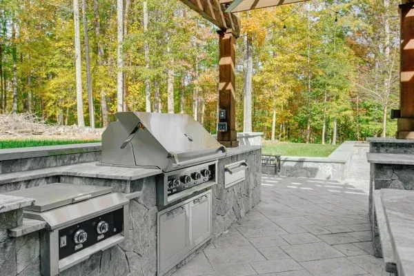 Stone outdoor kitchen build in Spring Grove PA enhancing patios with durable and elegant cooking areas