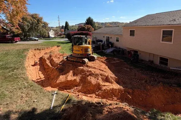 Underground utility installation excavation in Spring Grove PA preparing safe access for pipes cables and drainage systems