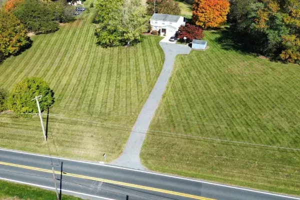 Weekly lawn maintenance in Spring Grove PA helping homeowners maintain lush attractive and professionally cared for lawns