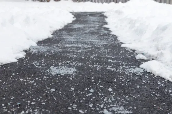 Winter ice control services in Spring Grove PA applying deicing solutions to improve safety on outdoor surfaces