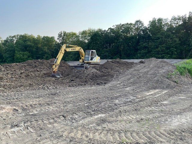 Male Worker Working At Construction Site - Ashland, OH - Aztec Topsoil