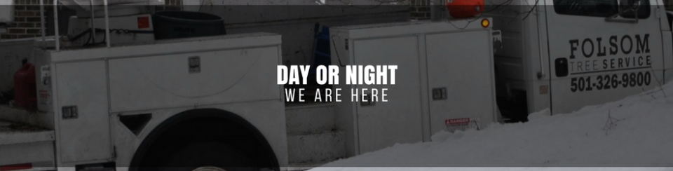 Bus side with bold white text reading “DAY OR NIGHT WE ARE HERE” and smaller “FOLSOM” lettering