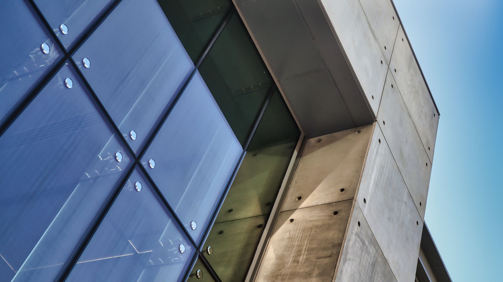Generic modern minimal view of a glass business tower.
