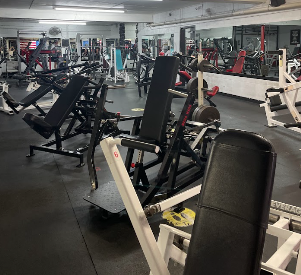 A gym filled with a lot of exercise equipment