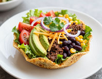 Vibrant taco salad in a tortilla bowl