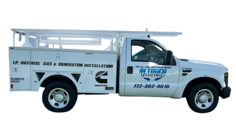 White utility service truck with ladder rack and company logo, side view on white background