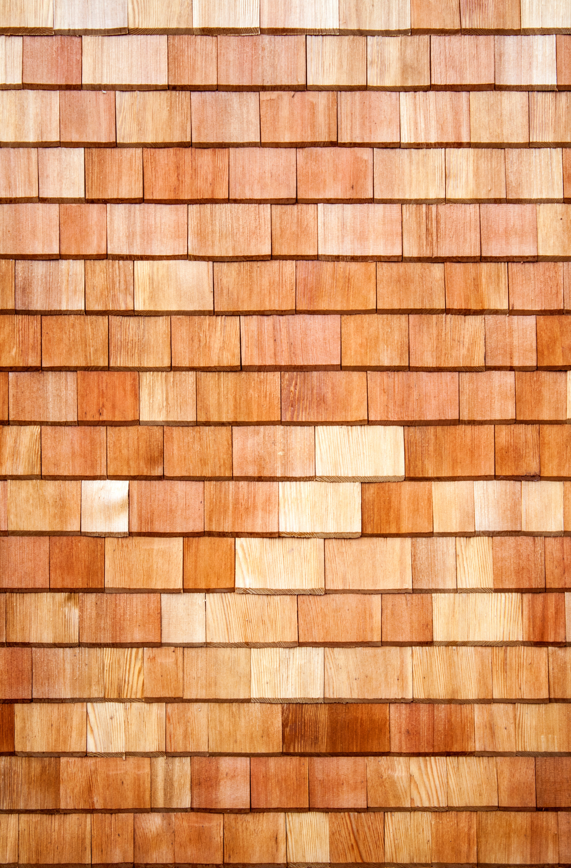 A close up of a shake roof of wooden tiles