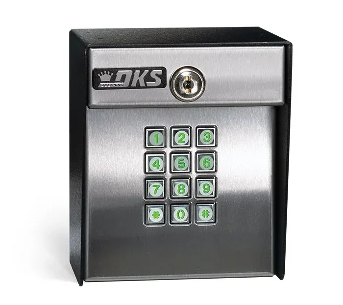 A stainless steel keypad with the word oks on it