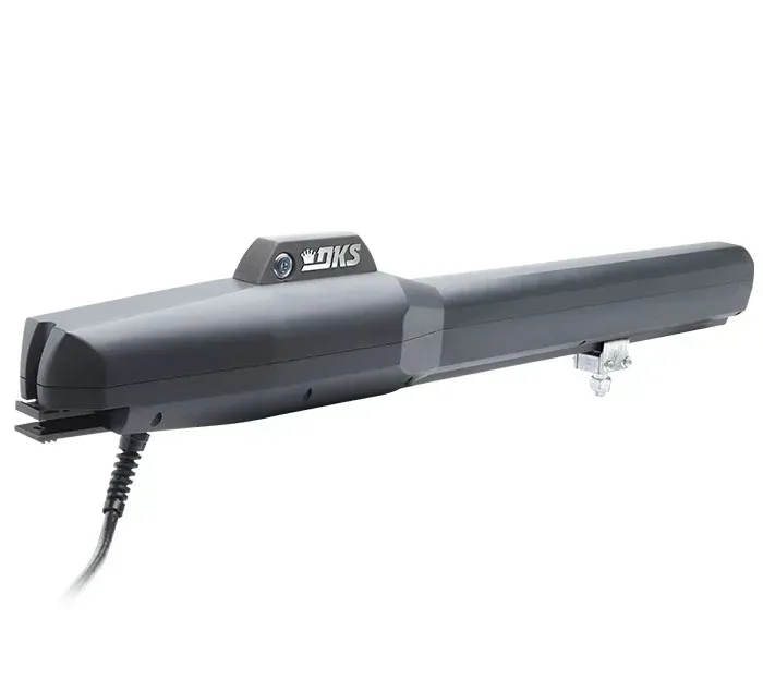 A black gate motor with a cord attached to it on a white background.