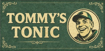 Vintage green label reading “TOMMY’S TONIC” with a smiling man’s portrait in a circular frame