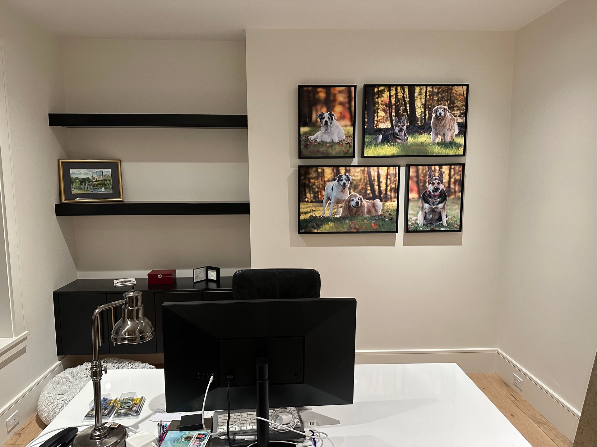 Custom dog photography wall art mockup showing framed portraits arranged in a client's home