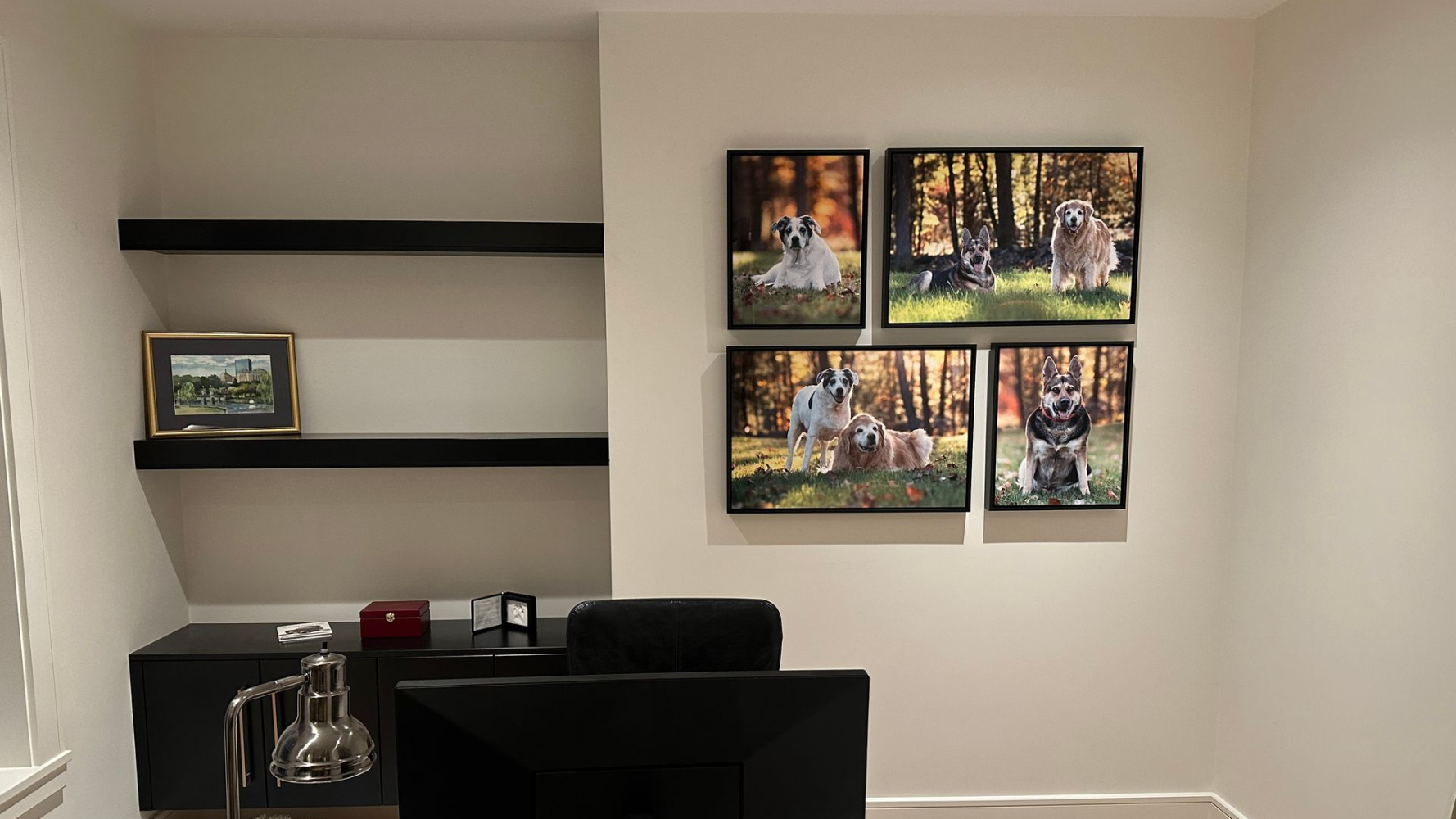 Professional dog photography wall art displayed in a home office featuring custom framed portraits