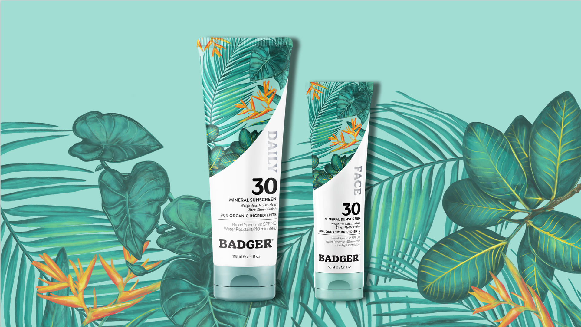 Two bottles of sunscreen are sitting next to each other on a green background.