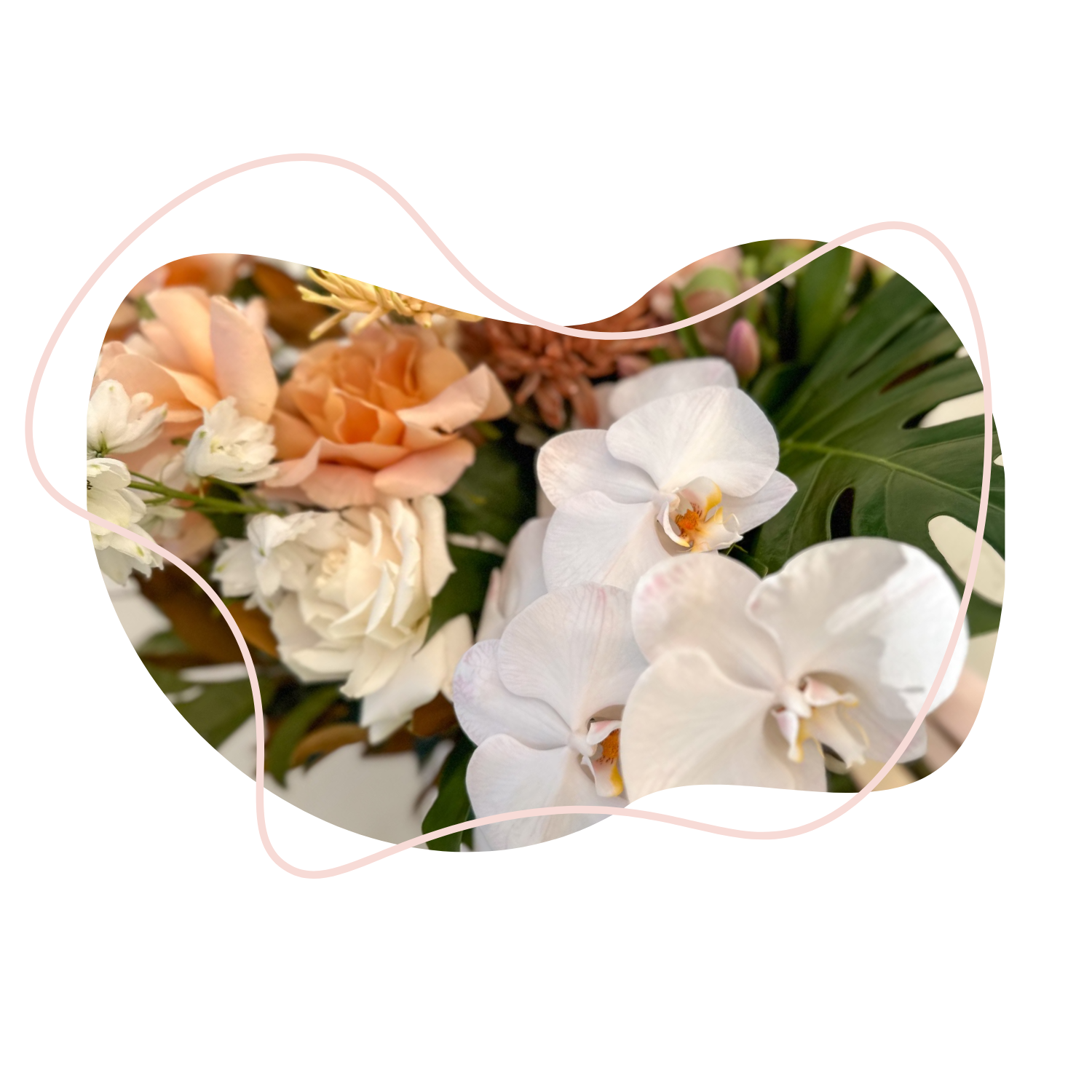 A Person Is Holding A Bouquet Of Flowers Wrapped In Brown Paper — Mittagong Flower Merchant in Mittagong, NSW