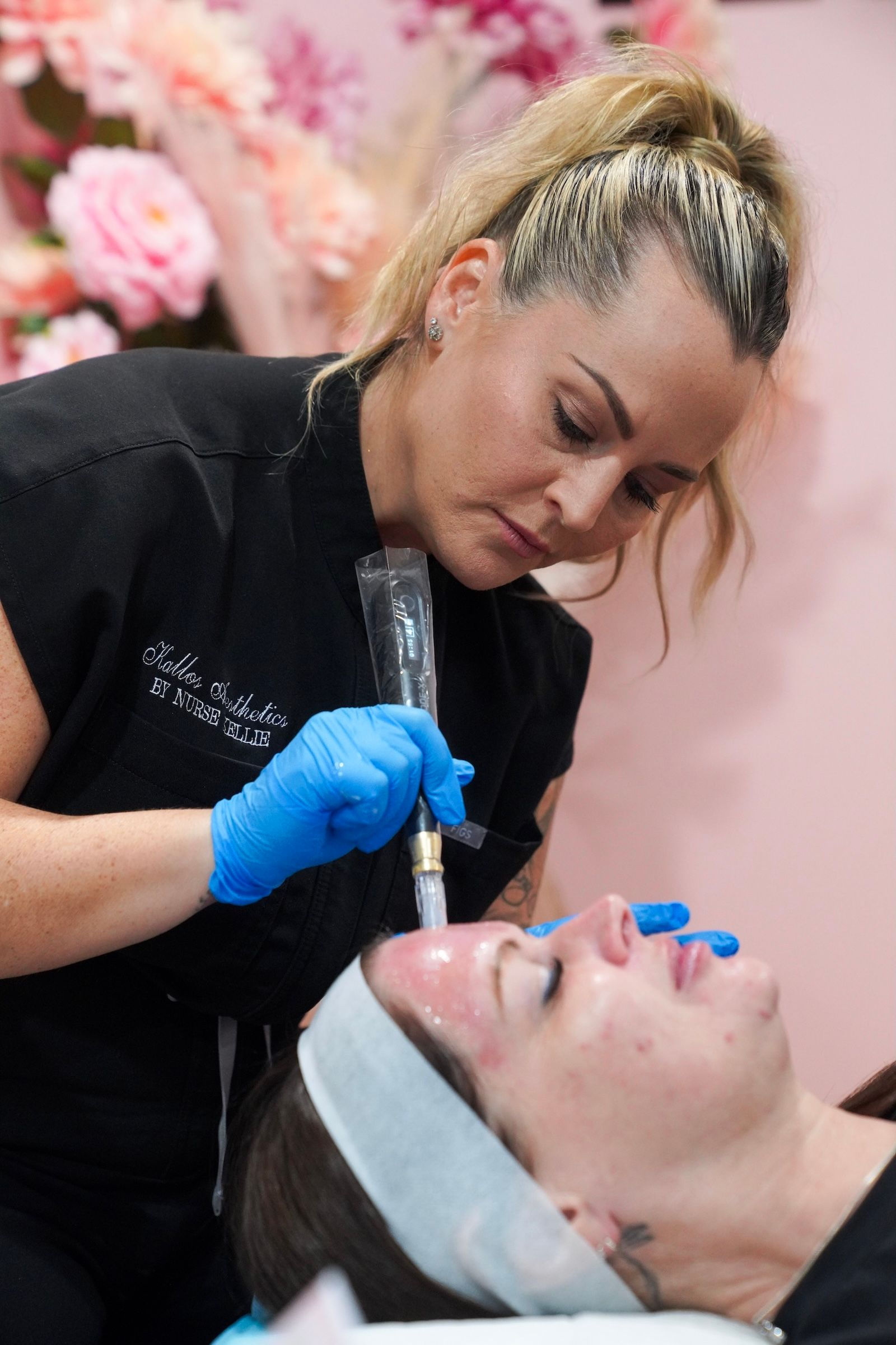 A Woman is Getting an Ultrasound Treatment on Her Face — Kàllos Aesthetics by Nurse Kellie In Urangan, QLD