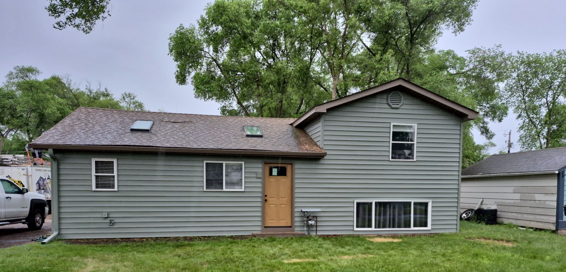 A home in Blaine with new seamless steel siding installed by ABC Seamless of Maple Grove.