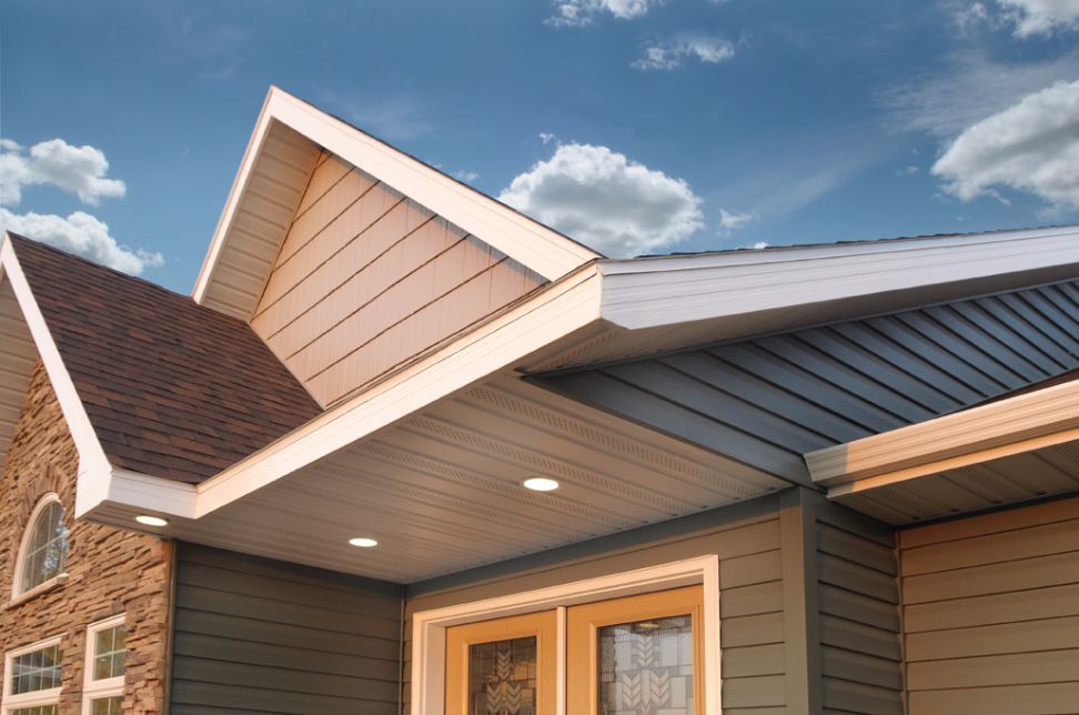 A house with a roof that has a triangle on it.