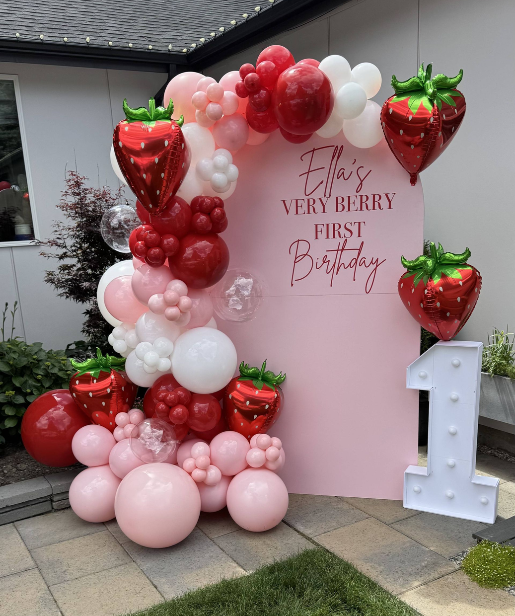 Strawberry balloons for first birthday party